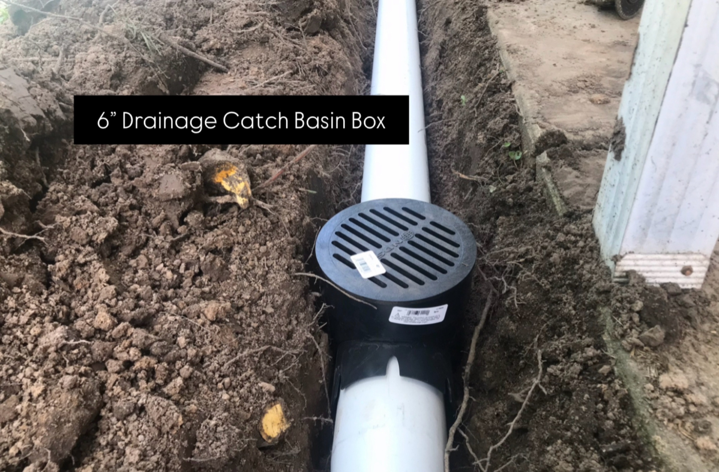 Catch basin tied into a drain pipe in a Houston trench
