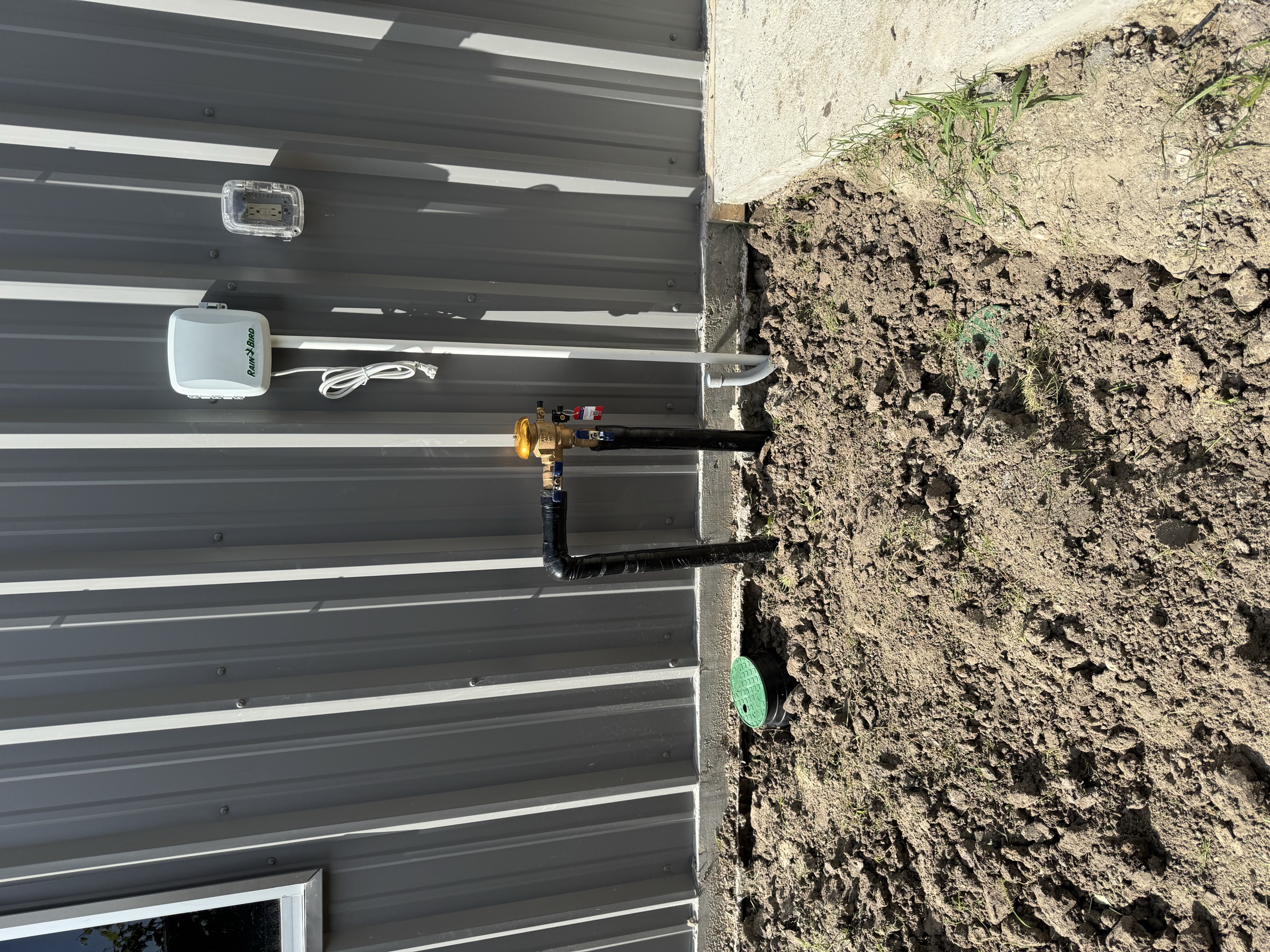 Irrigation controller and backflow on a Houston property